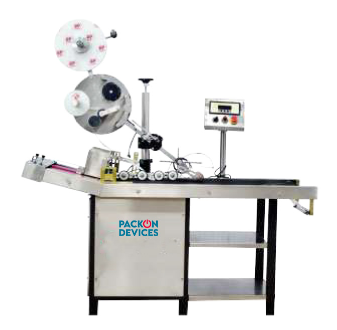 Feeder with label applicator