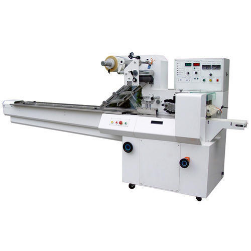 HORIZONTAL FLOW WRAPPING MACHINE